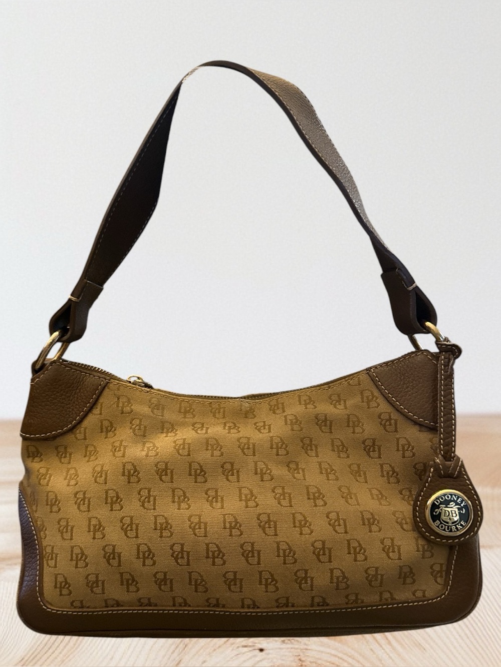 Dooney & Bourke Brown And Tan Canvas Hobo Shoulder Bag, Pebble Leather Trim.